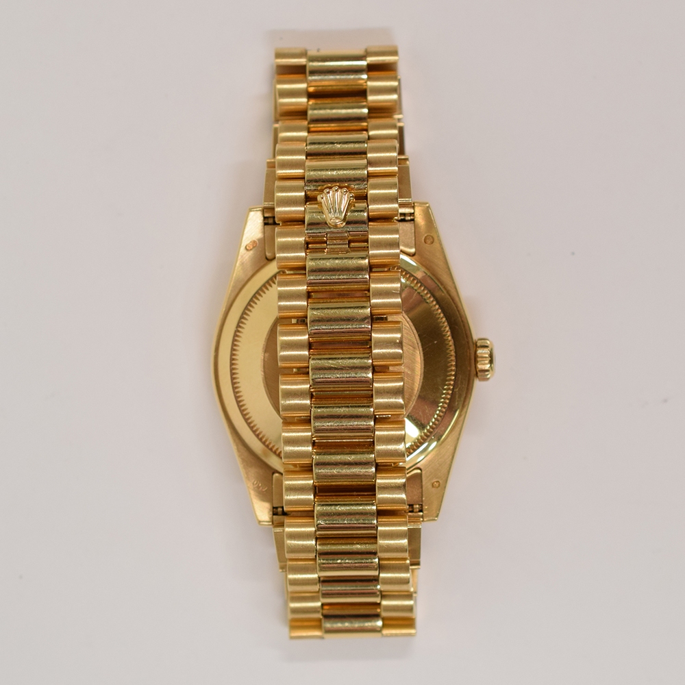 Rolex Day-Date Yellow Gold Champagne Myriad Roman 118238MR