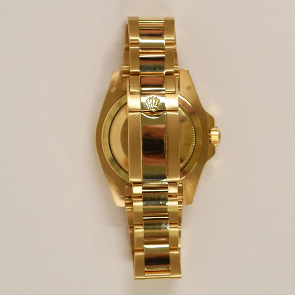 Rolex GMT-Master II Yellow Gold Sapphire/Ruby/Diamond Bezel Black Dial 116748SARU