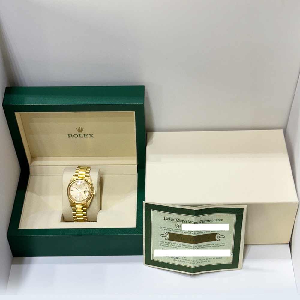 Rolex Day-Date President Complications 36mm Yellow Gold Champagne Stick Dial 1803