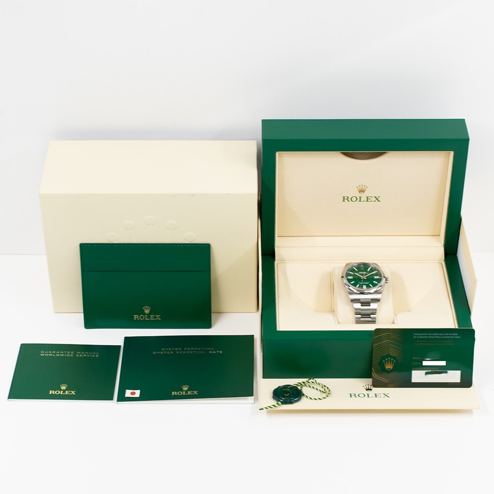 Rolex Oyster Perpetual Stainless Steel Green Stick Dial 124300