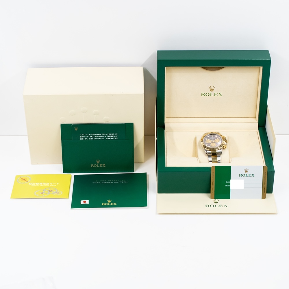 Rolex Daytona Stainless Steel and Yellow Gold Black MOP Dial 116503