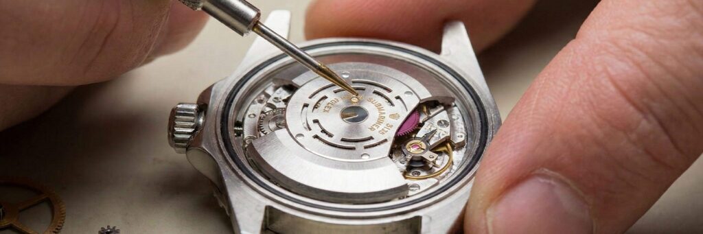 Rolex Submariner being overhauled by a watch expert