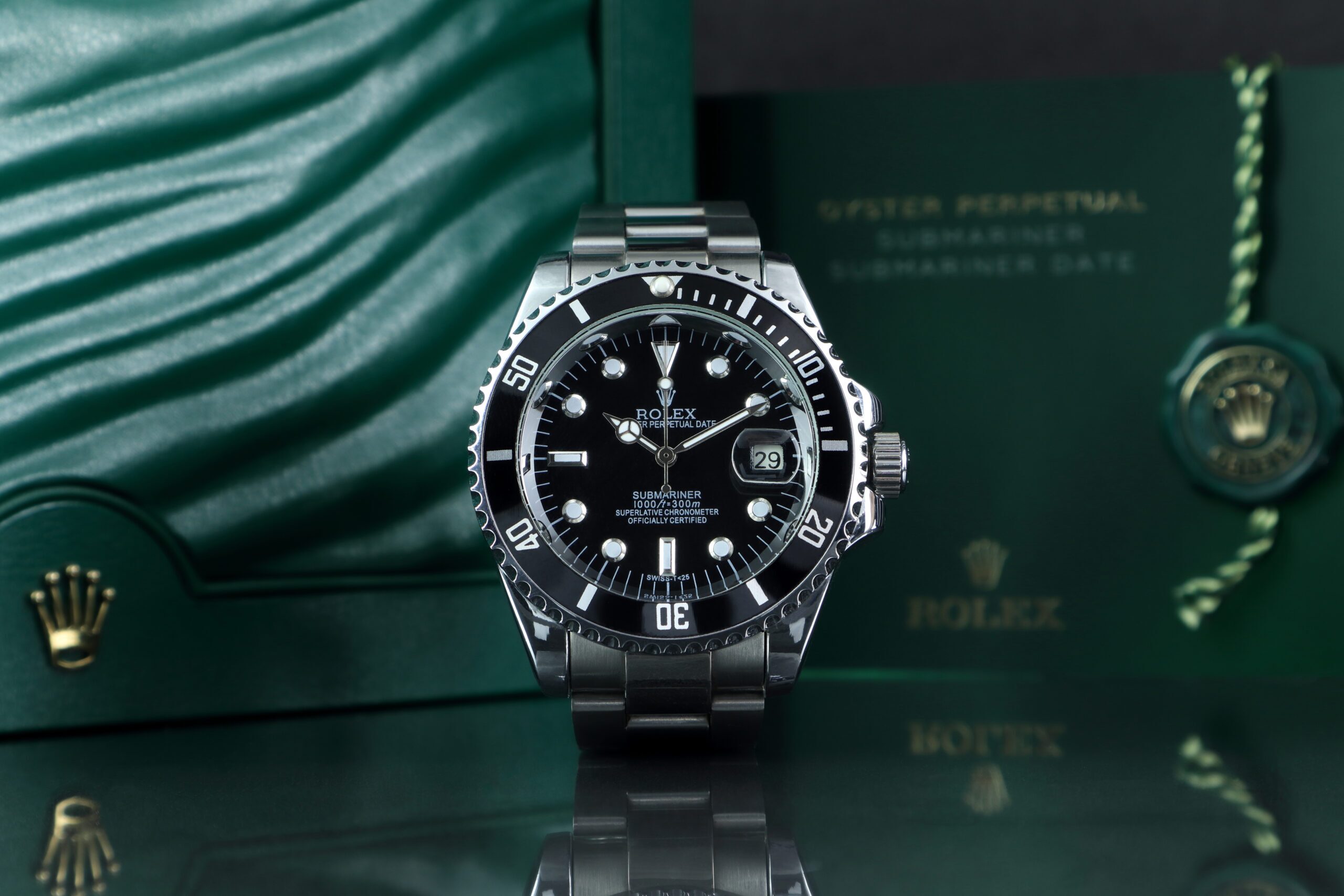 genuine rolex watch in front of the iconic green rolex box