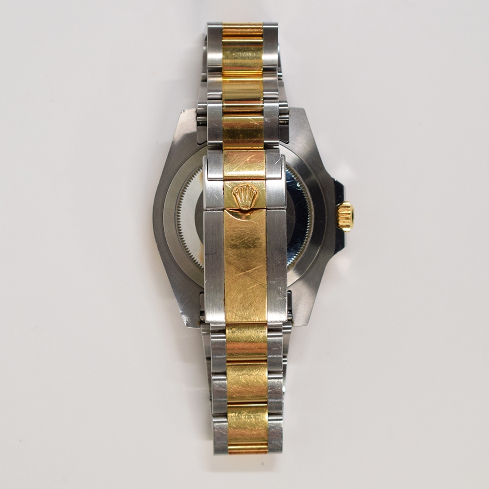 Rolex GMT-Master II Stainless Steel and Yellow Gold Black Dial 116713LN