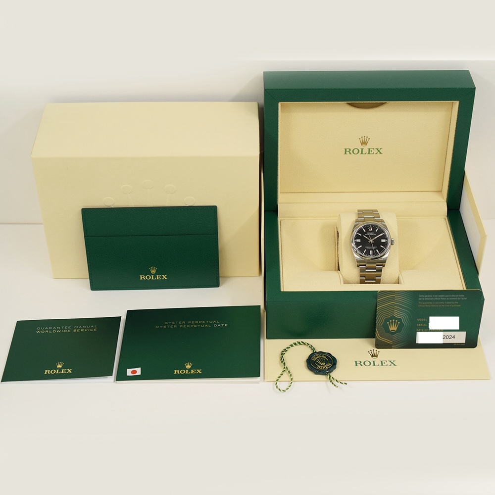 Rolex Oyster Perpetual Stainless Steel Black Stick Dial 126000
