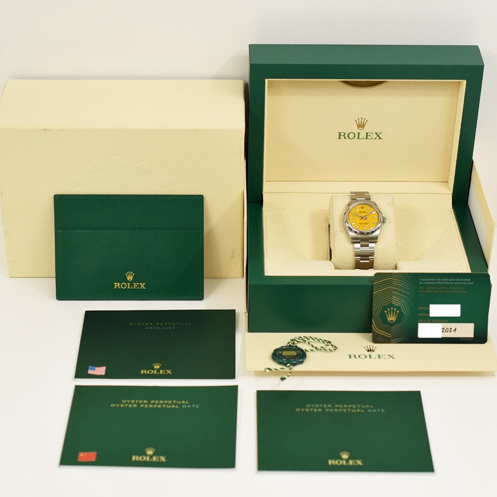 Rolex Oyster Perpetual 31 Stainless Steel Yellow Dial 277200