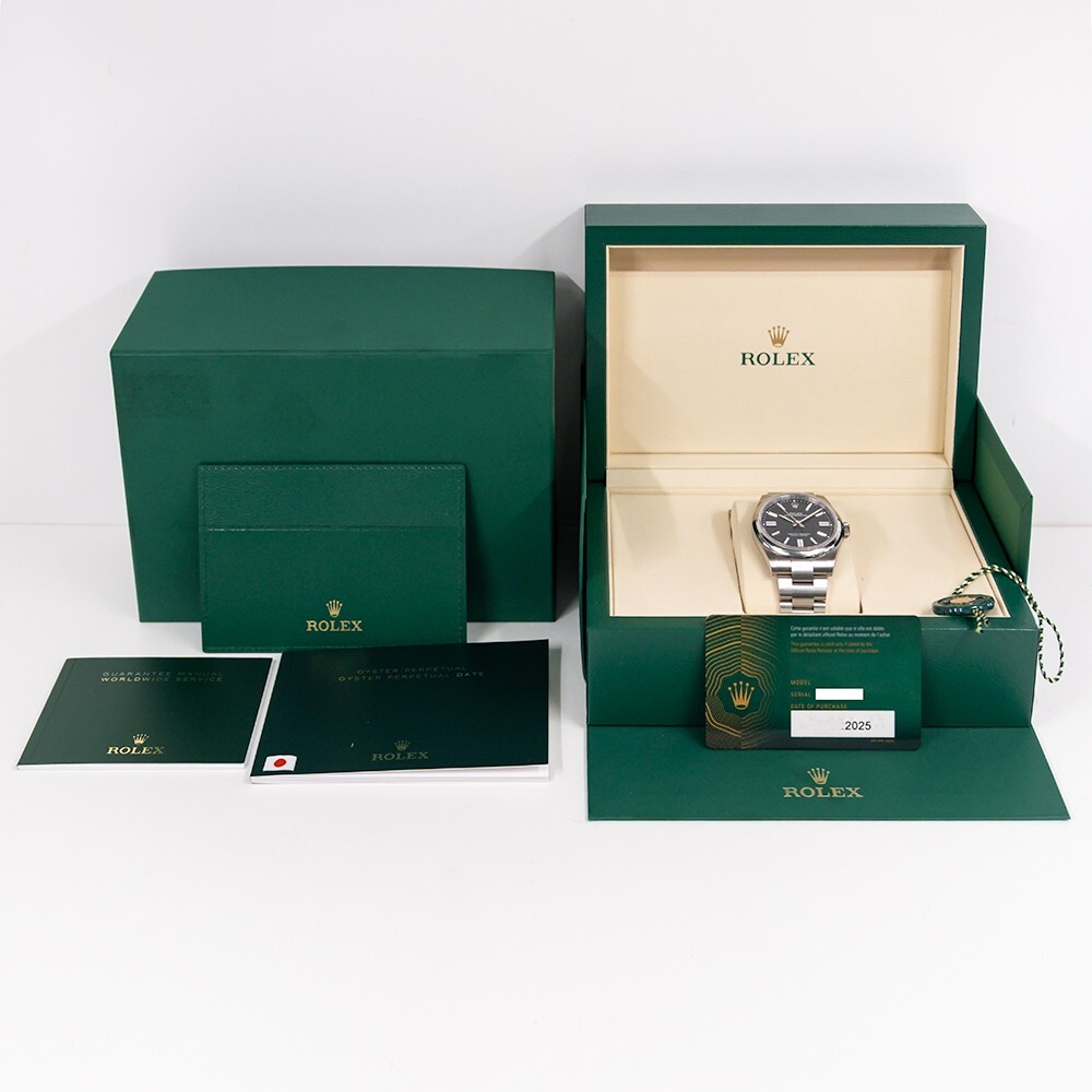 Rolex Oyster Perpetual Stainless Steel Black Dial 134300