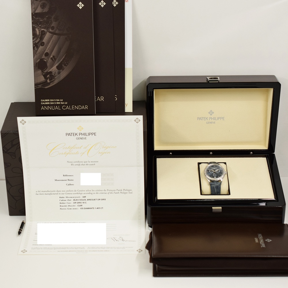 Patek Philippe Annual Calendar Complications Moon Phase White Gold Blue Arabic Dial 4947G-001