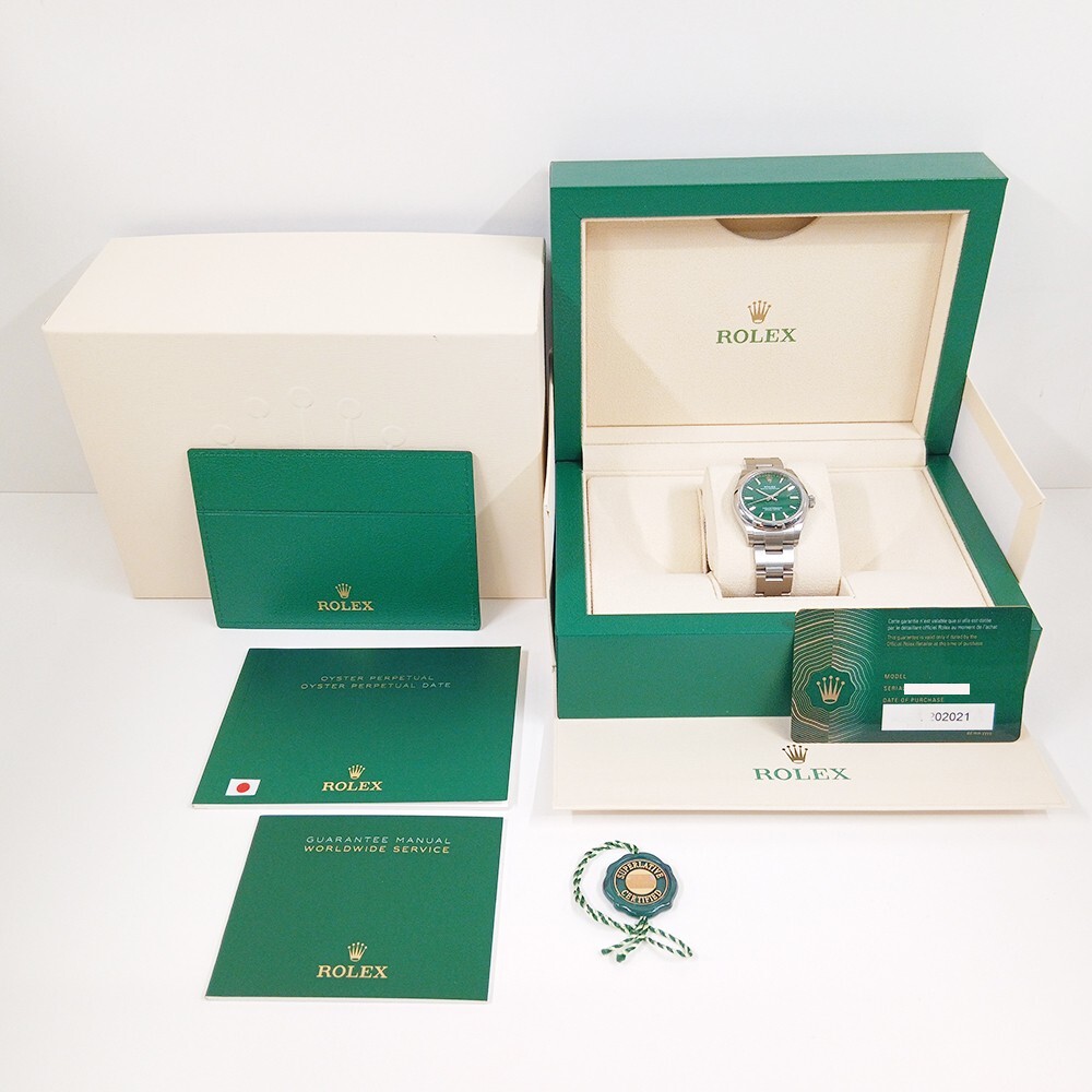 Rolex Oyster Perpetual 31 Stainless Steel Green Dial 277200