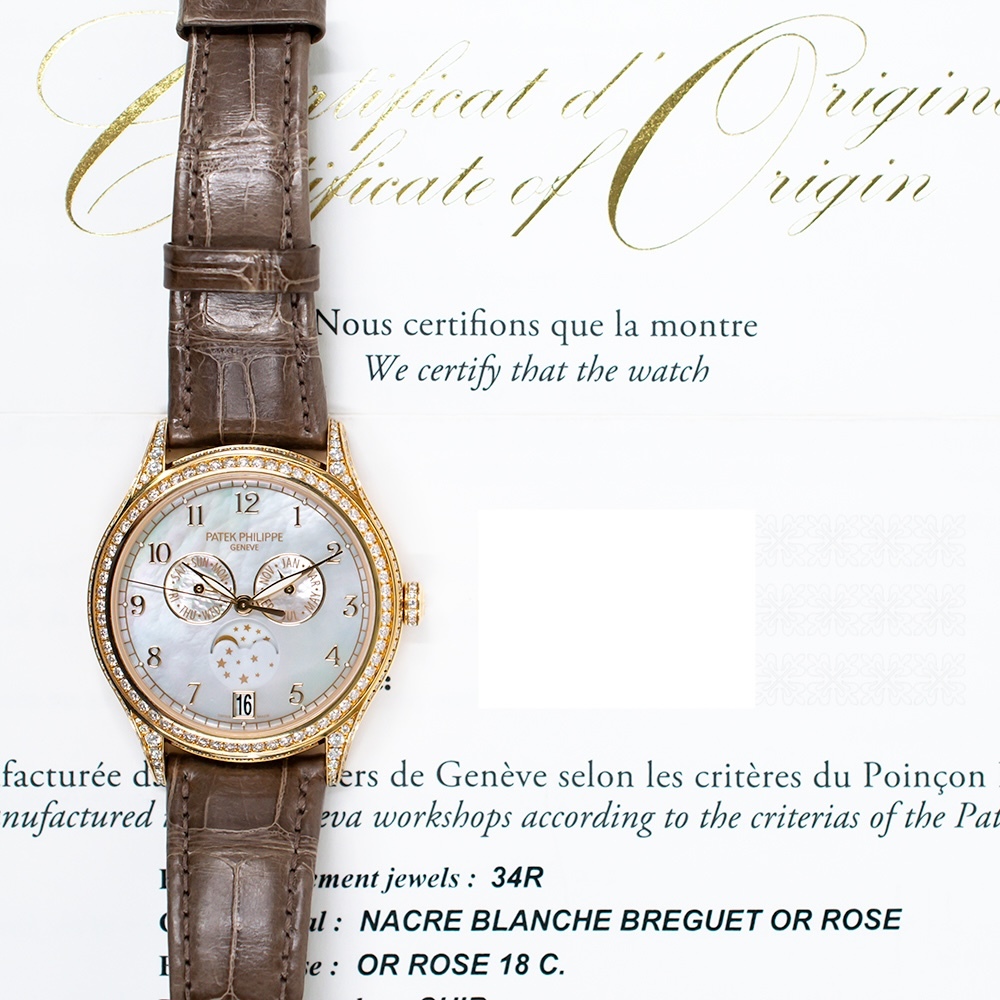 Patek Philippe Annual Calendar Rose Gold Diamond Bezel MOP Dial 4948R-001