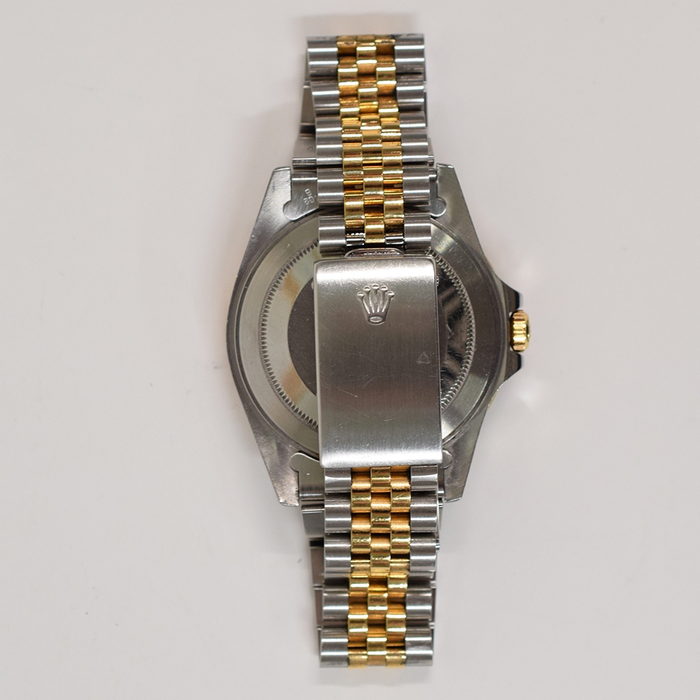 Rolex GMT-Master II Stainless Steel and Yellow Gold Black Dial 16713