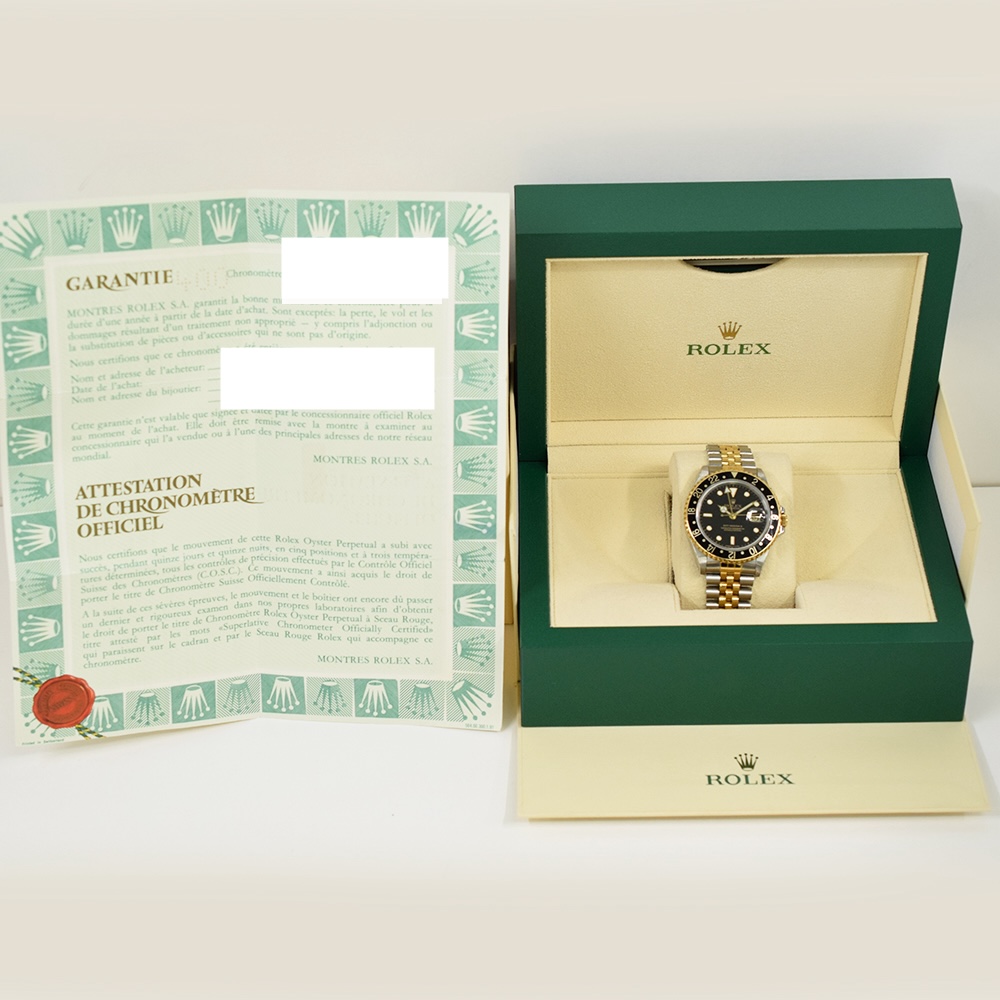 Rolex GMT-Master II Stainless Steel and Yellow Gold Black Dial 16713