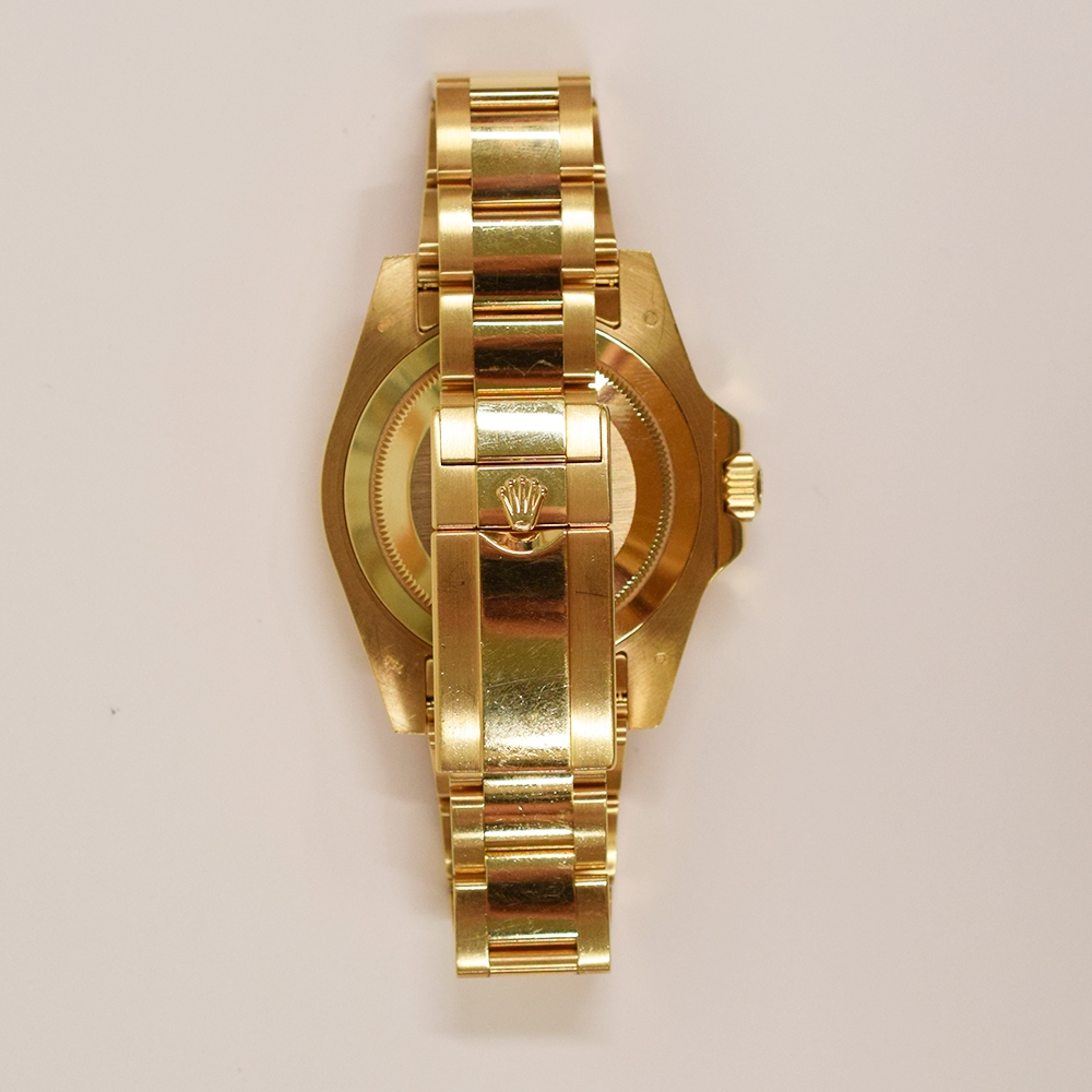 Rolex GMT-Master II Yellow Gold Green Dial 116718LN