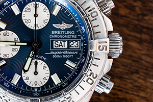 Close up of a breitling watch before a watch overhaul service