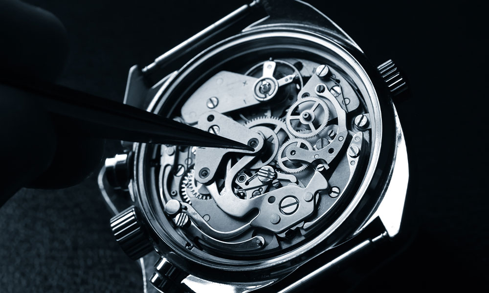 Closeup of watch repair service on a luxury watch